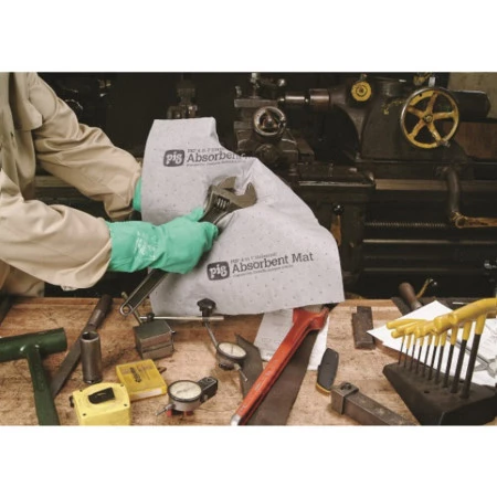 recueillir les égouttements et les fuites sous la machinerie ; protéger les établis ; absorber les éclaboussures recueillir les égouttements et les fuites sous la machinerie ; protéger les établis ; absorber les éclaboussures