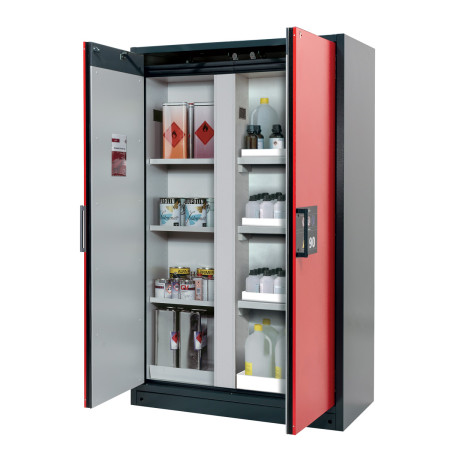 Armoire de sécurité pour liquides inflammables, étagères amovibles, portes rouges. Armoire de sécurité pour liquides inflammables, étagères amovibles, portes rouges.