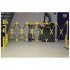 Barrière extensible à fixation murale avec roues Barrière extensible à fixation murale avec roues